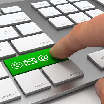 pressing on green button keyboard mail online faxing